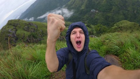 Young Hiker Traveler Man Taking Selfie At Mountain Top. 4K.
