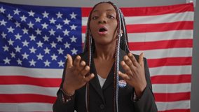 A professional african american woman with braids stands confidently in an office with a usa flag backdrop. - Powered by Shutterstock - Get 15% off with code: PIKWIZARD15