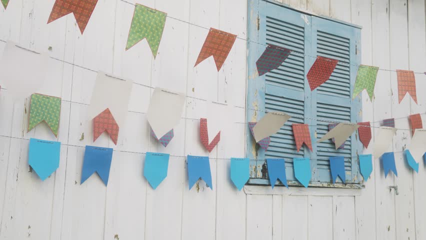 Festa Junina: party in Brazil, back of brazilian couple walking at arraial event in caipira style