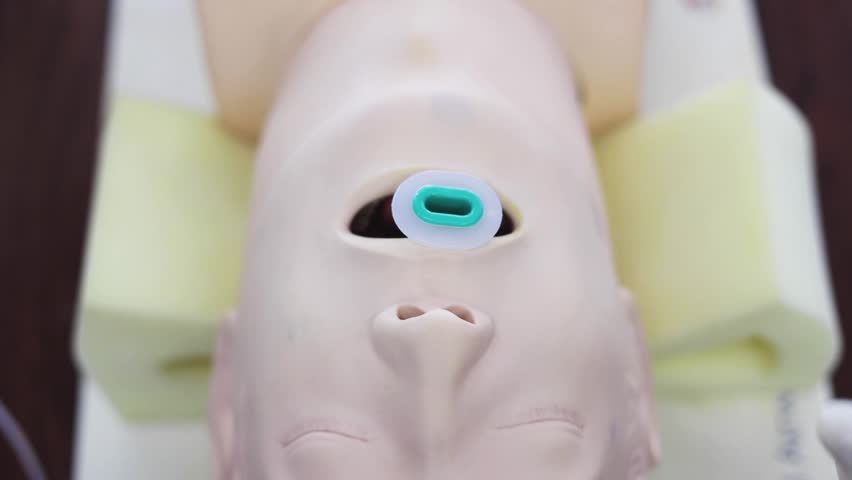 Manual Resuscitator Mask being used with Proper Technique on na Advanced Airway Dummy Artificial Patient