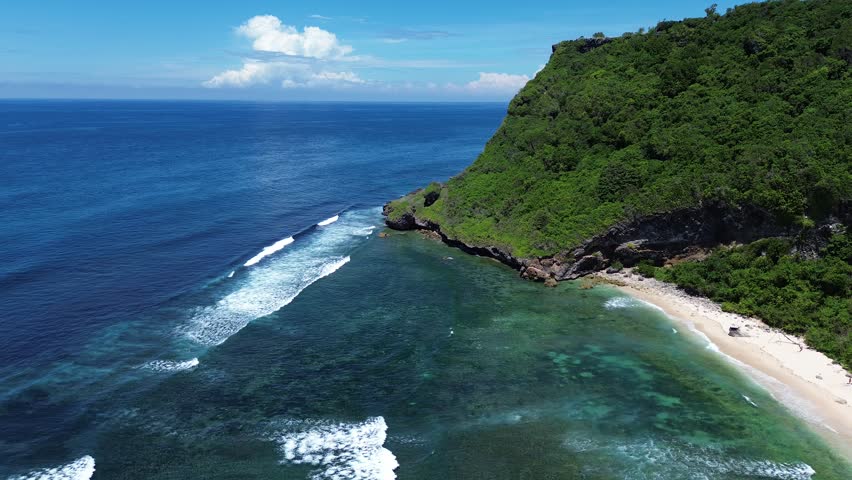 Green cliff of Nyang Nyang Beach - Bukit Peninsula, Bali, Indonesia Royalty-Free Stock Footage #3478912309