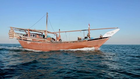 MANAMA, BAHRAIN - January 12 : View of traditional fishing boat sailing towards fishing ground in Bahrain sea on January 12, 2018