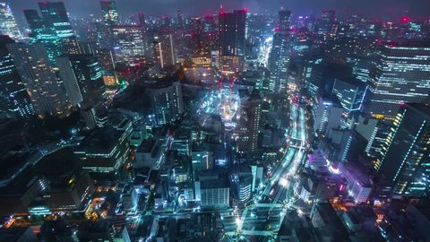 Time-lapse of traffic moving through Toranomon, Tokyo, Japan at night Video Stok
