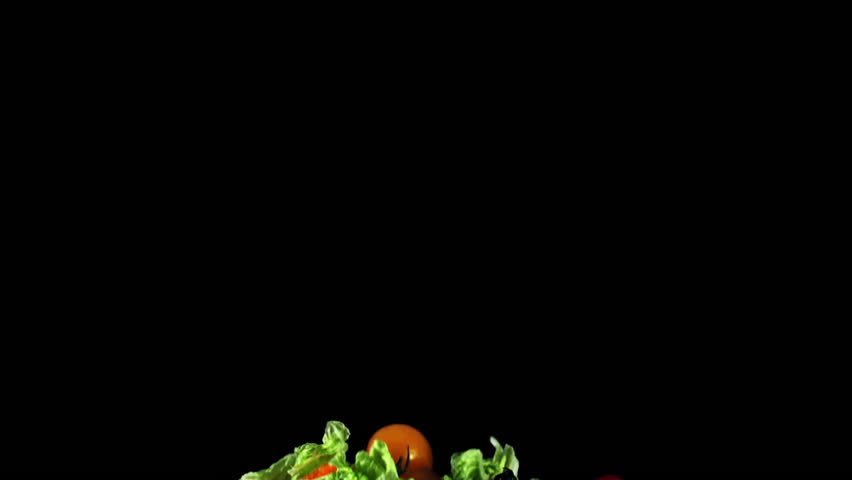A delicious salad made with fresh natural foods like lettuce, tomatoes, peppers, and onions