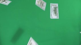 Flying money on green background, scattering cash 100 dollar bills close up. - Powered by Shutterstock - Get 15% off with code: PIKWIZARD15