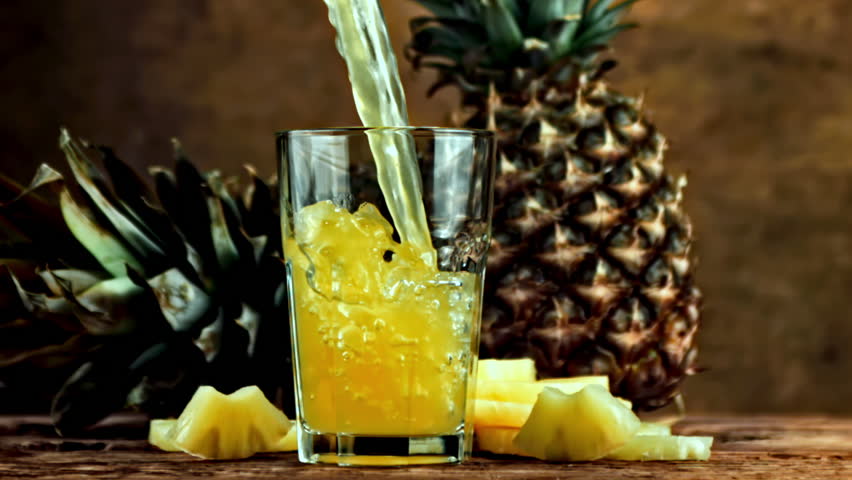 Super slow motion pineapple juice. High quality FullHD footage