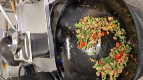 close-up of the Thai dish Pad kra pao in a wok