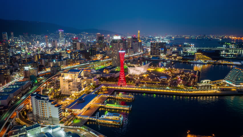 Aerial view of Cityscape and traffic at night in Kobe, Japan.