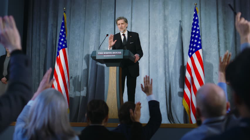 Presidential of USA candidate makes an announcement, delivers campaign speech, answers questions, gives interview to media. American republican politician performs at press conference. Election day.