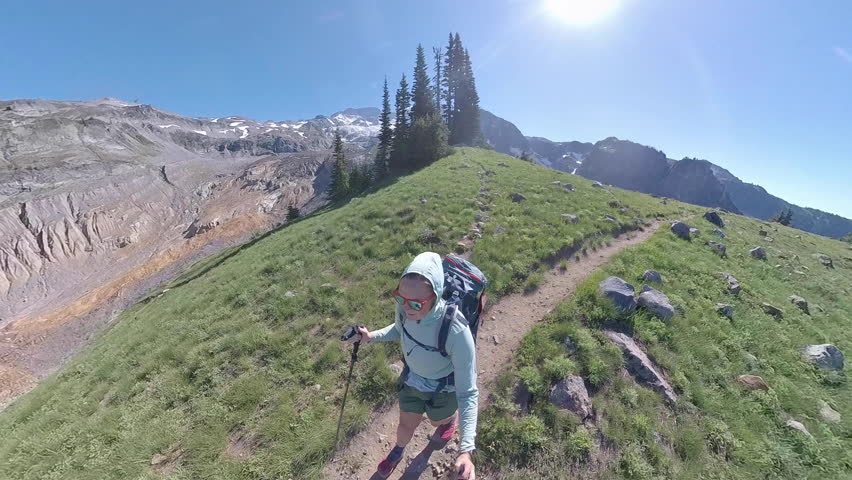 Overhead of Woman Walking Along Wonderland through Emerald Ridge in Mount Rainier National Park