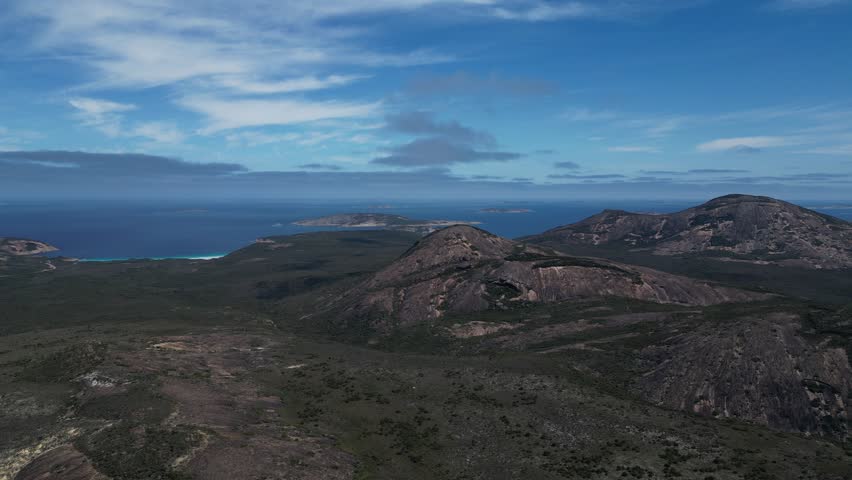 Aerial view of mountains at Cape Le Grand Area, Western Australia. Great Australian bight in background. Panorama wide shot.