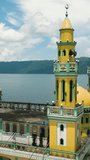 Tropical Landscape with Linuk Masjid mosque and Lake Lanao in Lanao del Sur. Mindanao, Philippines. Vertical video.