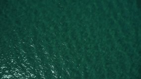Aerial view top-down view blue ocean wave texture water surface.	