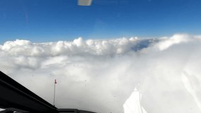 Time lapse. Helicopter view of the gorge through the clouds. 
