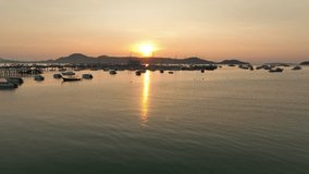 View of the bay with boats, dawn, aerial video from a drone