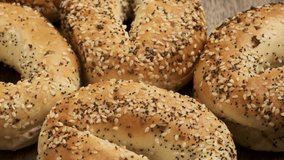 Seedy Delight: Sliced Organic Bagel with Seeds in 4K video