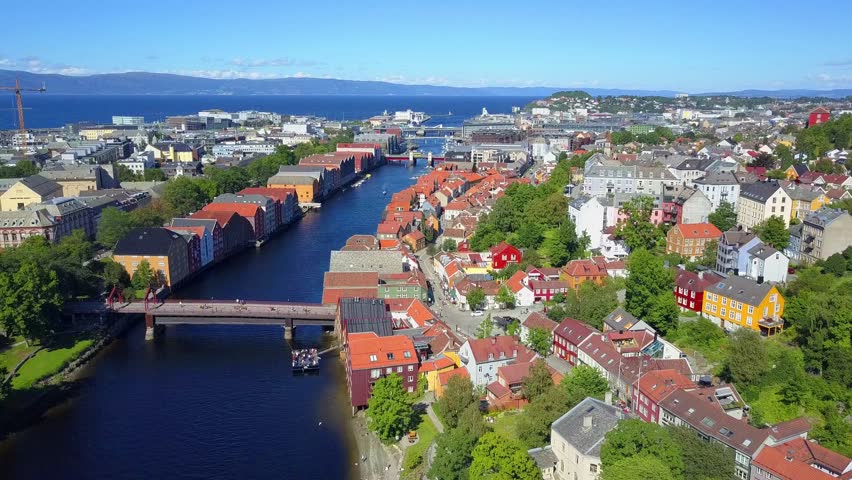Colorful old houses at the Nidelva river embankment aerial view in the center of Trondheim town in Norway