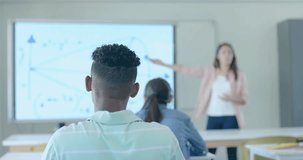 Animation of ai data processing over diverse students at school. Artificial intelligence, education, connections, computing and data processing concept digitally generated video.