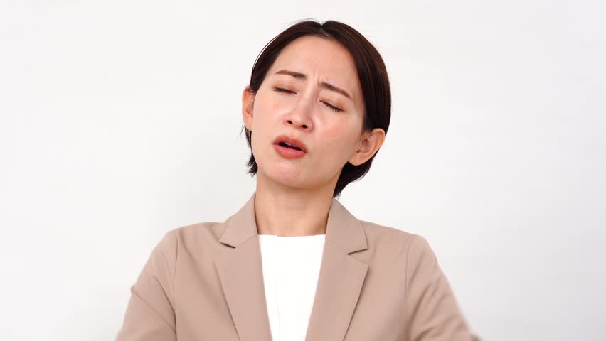 Angry Asian businesswoman in white background Royalty-Free Stock Footage #3480193191