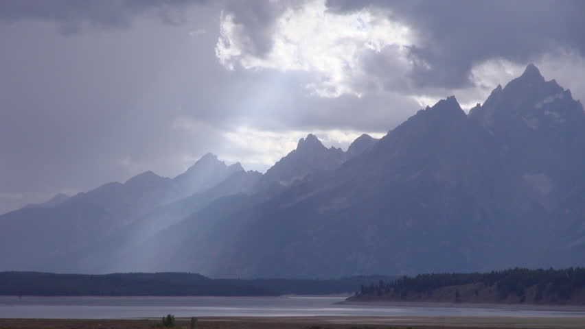 Time Lapse of Sunrays out of Clouds on Mountain of National Park