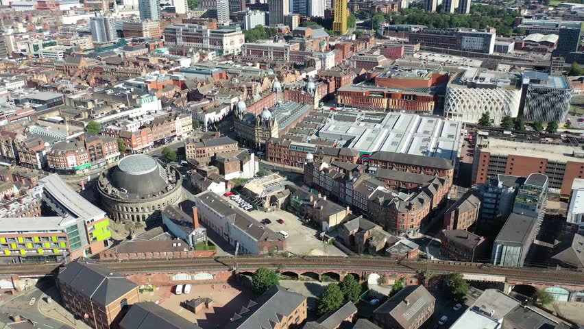 Aerial footage of the Leeds town centre, showing the Leeds kirkgate market and Leeds Corn Exchange in the West Yorkshire city centre in the UK along side the train station.