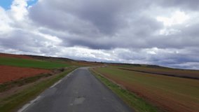 Car driving on a mountain road in northern Spain with storm clouds - Powered by Shutterstock - Get 15% off with code: PIKWIZARD15