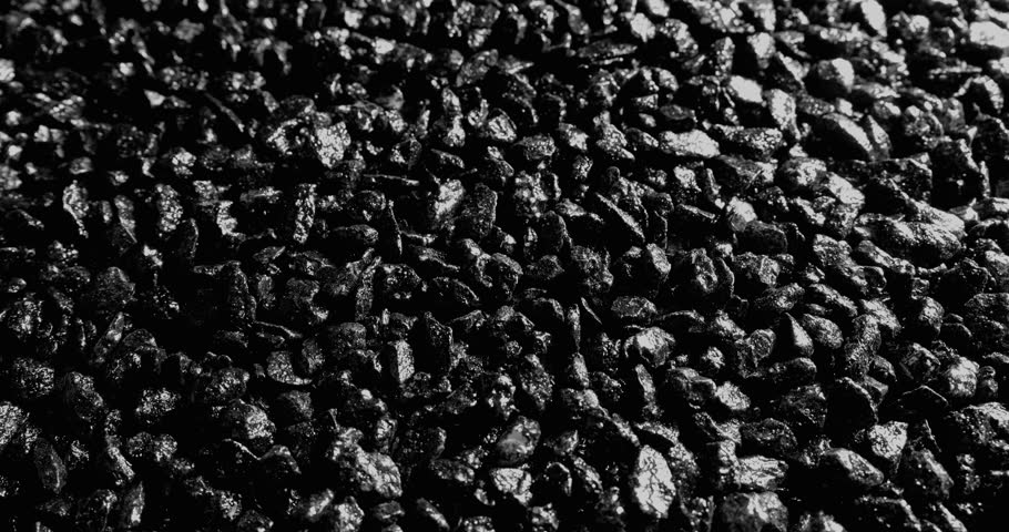 Black stones. Abstract background. Black grunge background. Сlose-up.