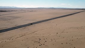 A Road in the Atacama Desert, Chile, The Driest Nonpolar Desert in the World. Drone View. 4K Resolution. - Powered by Shutterstock - Get 15% off with code: PIKWIZARD15