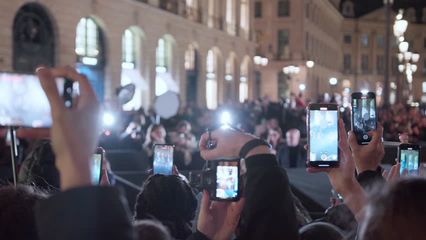 Paparazzi taking photos on the red carpet. Close up photo cameras. 