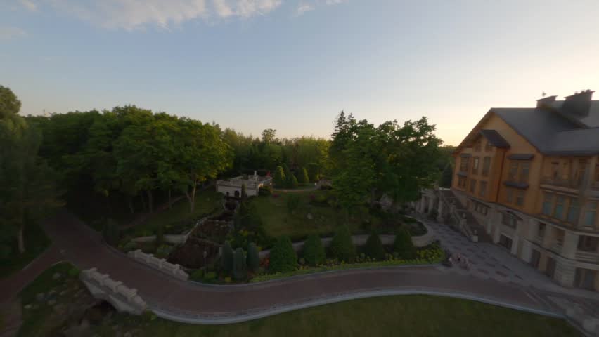 National Park in Ukraine. garden design. 4k top aerial view from above. Amazing house building rich residence Yanukovych. Drone camera view above elite palace pond