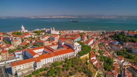 Lisbon Portugal aerial view Sunny day Tagus river Red roofs Old town