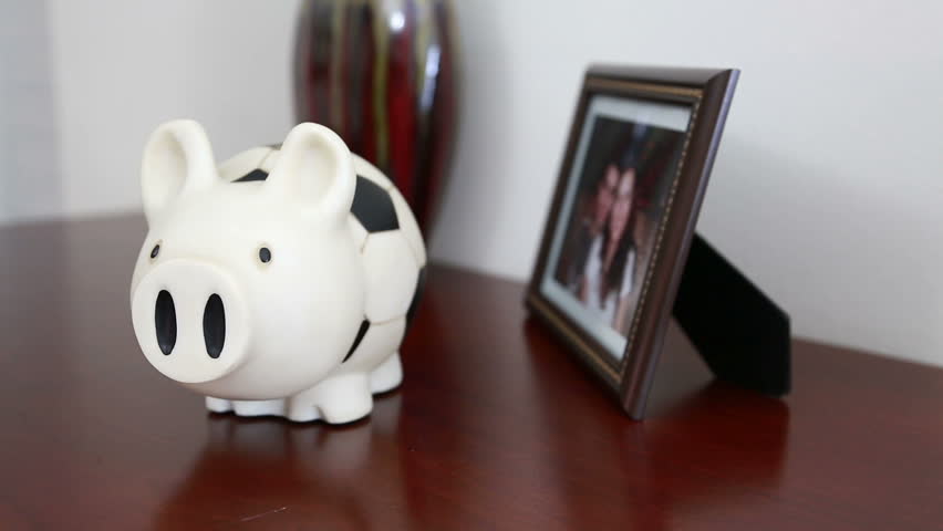 piggy bank with money picked up