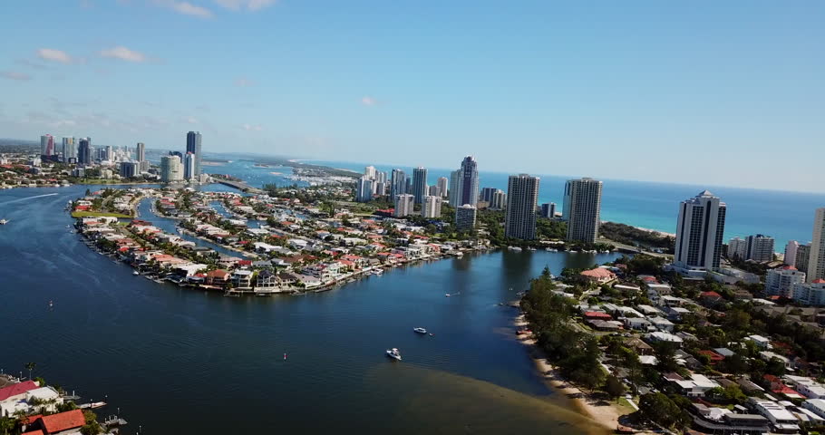 Residential canal and high rise homes in city of Gold Coast, Queensland, Aust