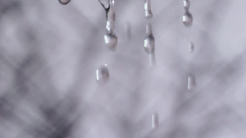 Droplets of water against a soft neutral background