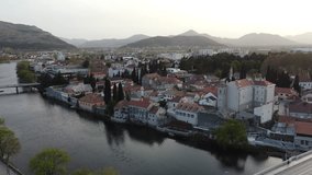 Drone fly over the sunny town Trebinje