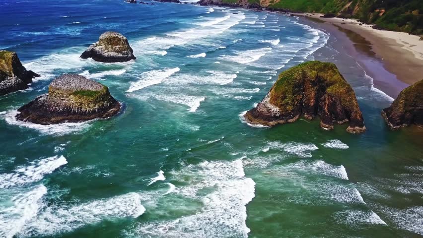 Aerial Serenity: Flying Over Cannon Beach in Oregon, USA in 4K Video Royalty-Free Stock Footage #3481077441