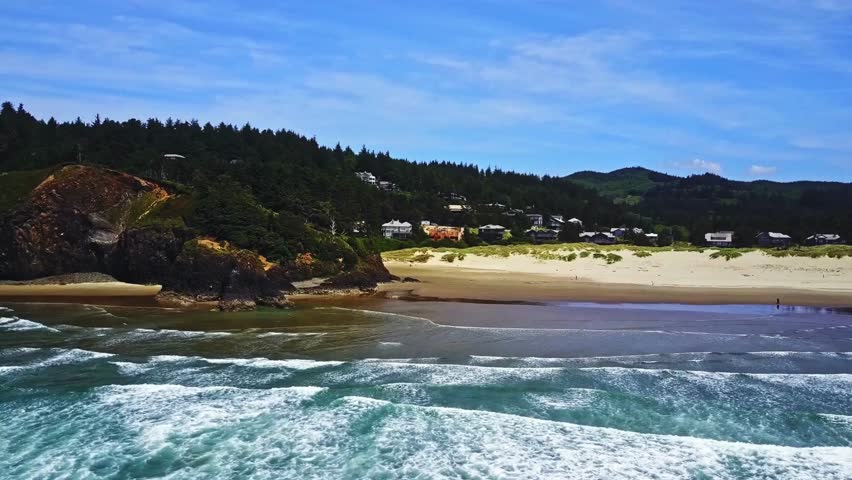 Aerial Serenity: Flying Over Cannon Beach in Oregon, USA in 4K Video Royalty-Free Stock Footage #3481077743