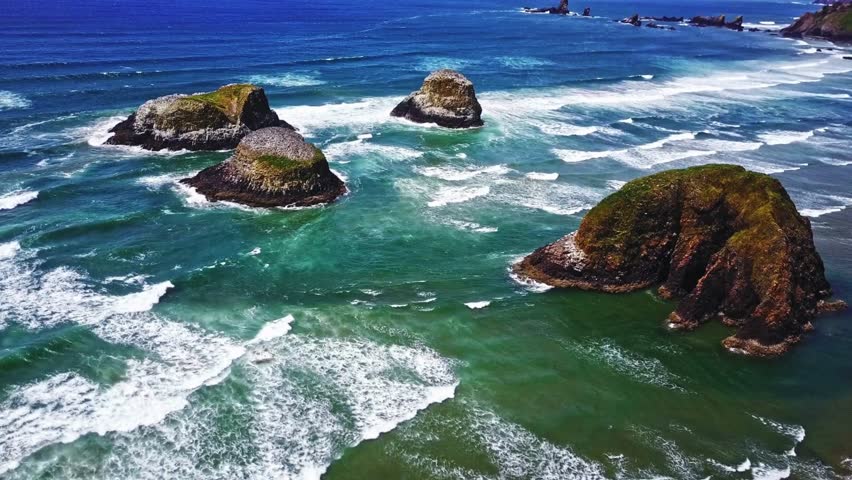 Aerial Serenity: Flying Over Cannon Beach in Oregon, USA in 4K Video Royalty-Free Stock Footage #3481081997
