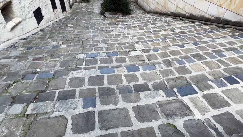 Walking down the old granite steps in the old town.