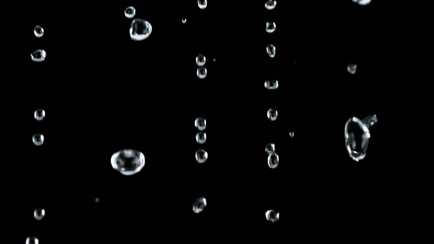 Super Slow Motion Shot of Water Shower. Filmed on High Speed Cinematic Camera at 1000 Frames per Second