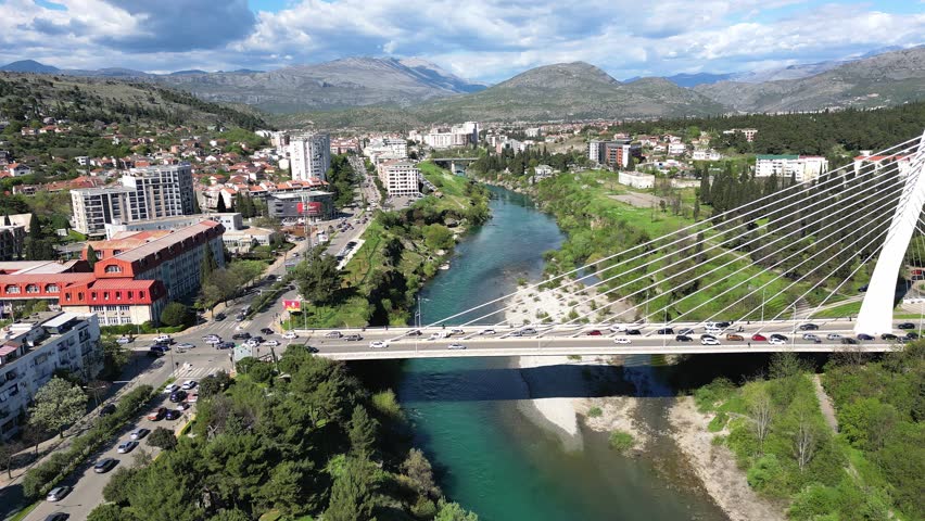 Aerial view of the Millennium Bridge and Moraca River in the city center of Podgorica in Montenegro