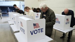 4K: Senior Caucasian man Voting at Polling Place for the USA Presidential Election. 70-74 years. People vote around him. Stock Video Clip Footage - Powered by Shutterstock - Get 15% off with code: PIKWIZARD15