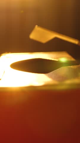 Female novelist type text on red old mechanical typewriter. Publishing story in new book. Novel manuscript. Work of literature writer or author. Silhouette on dramatic sunset, warm color