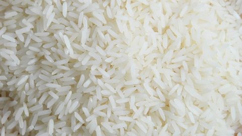 close up of a pile of raw rice