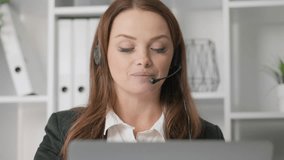An experienced lady working in a call center is ready to provide quality support via phone and video call. Her professional approach makes interacting with the company easy and efficient.