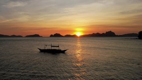 4K Aerial Drone video of sunset at Vanilla beach, El Nido, Philippines, golden hour