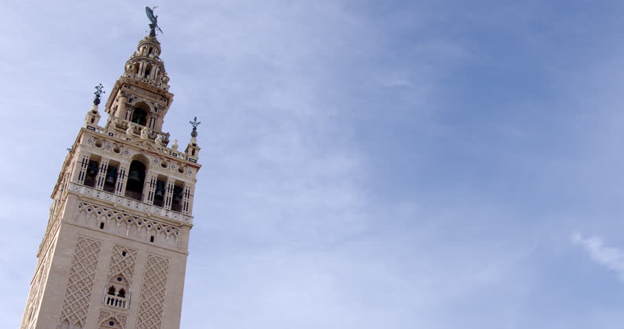 The Giralda bell tower of Seville Cathedral in Seville, 16th-century belfry at the top of the Giralda tower, Spain