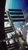 International Space Station over the planet earth. Elements of this image furnished by NASA