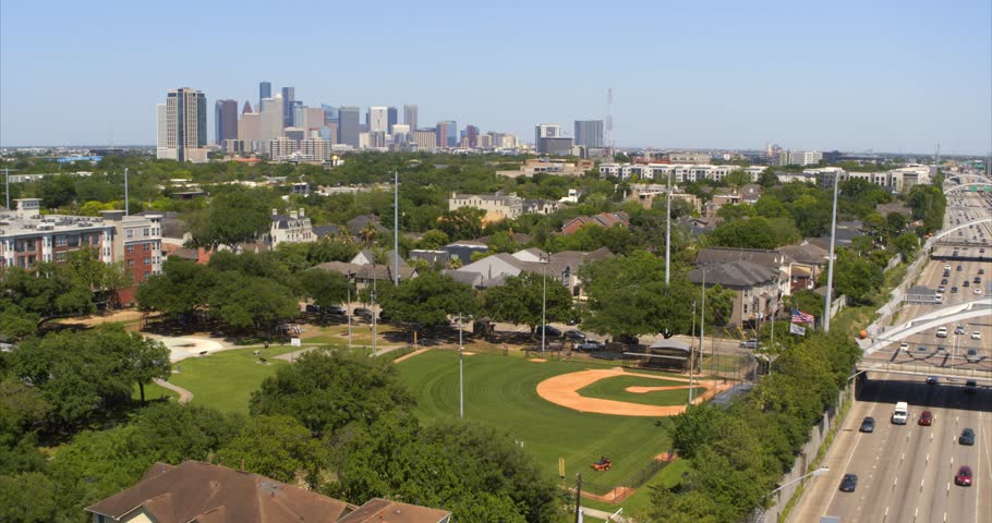 Drone view of homes in affluent upper middle class Neighborhood in Houston, Texas Royalty-Free Stock Footage #3482089523