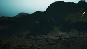 A Majestic Desert Monolith Rising Amidst the Barren Sands - Powered by Shutterstock - Get 15% off with code: PIKWIZARD15